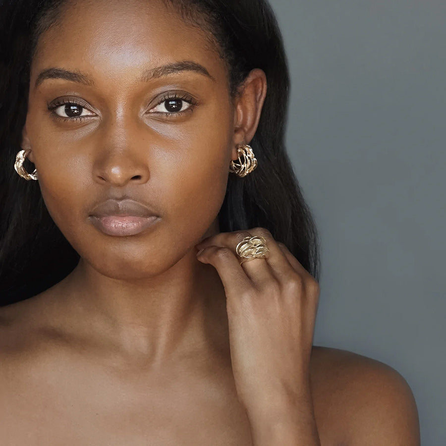 Model wearing Yellow Bronze Banksia Hoop Earrings by KMJ